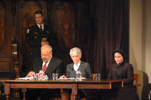 A photo of the retrial, with Pam Brown as Mary Lincoln, seated with her attorneys, Hon. Mark Drummond and Hon. Lorna Propes.