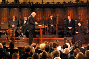 A photo of the Hon. Mark Drummond as he interrogates Pam Brown as Mary Lincoln at retrial at Murphy Auditorium in Chicago.