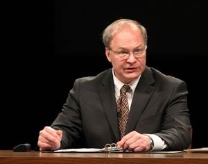 A photo of panel Moderator Scott Szala speaking.