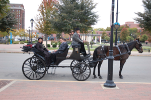 A photo of Pam Brown portraying Mary Lincoln Pam Brown, as Mary Lincoln, arrives at the Abraham Lincoln Presidential Museum with her attorneys, Hon. Lisa Holder White, Hon. R. C. Bollinger, and expert witness, Dr. Terry Killian. October 2012